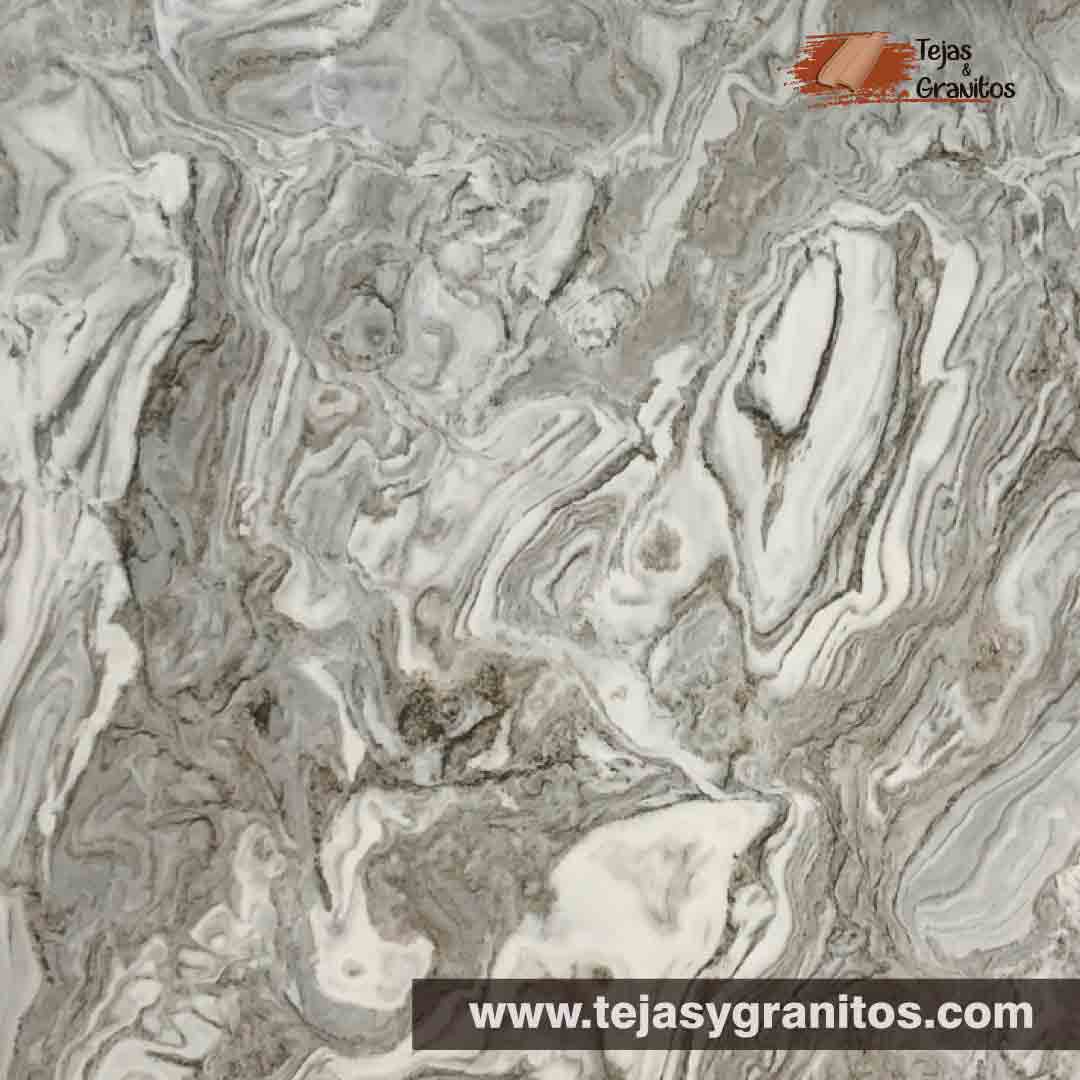 Granito Avalanche de color blanco con tonalidades grises en forma de ondas.
